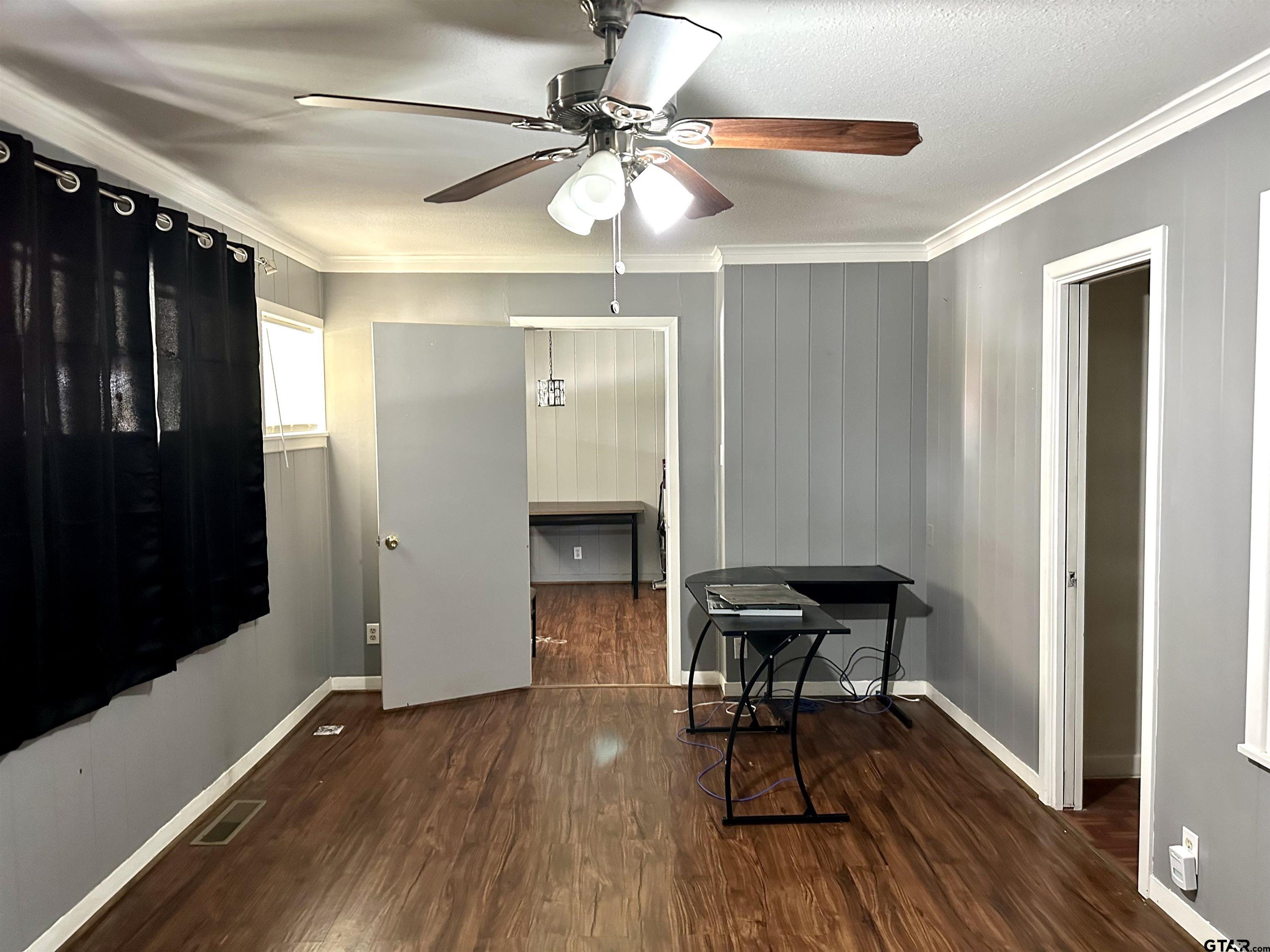 3112 Hallmark Place Tyler, TX 75701 - Photo 13 of 16 a view of a workspace with furniture and wooden floor