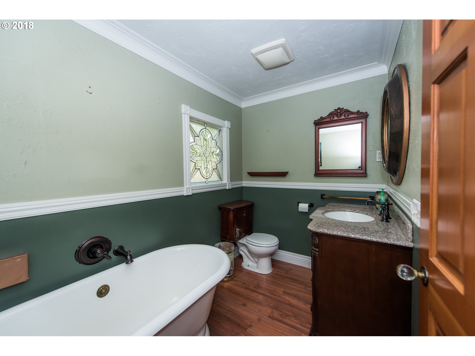 29503 Old Rainier Road Rainier, OR 97048 - Photo 13 of 22 a bathroom with a sink a toilet and mirror