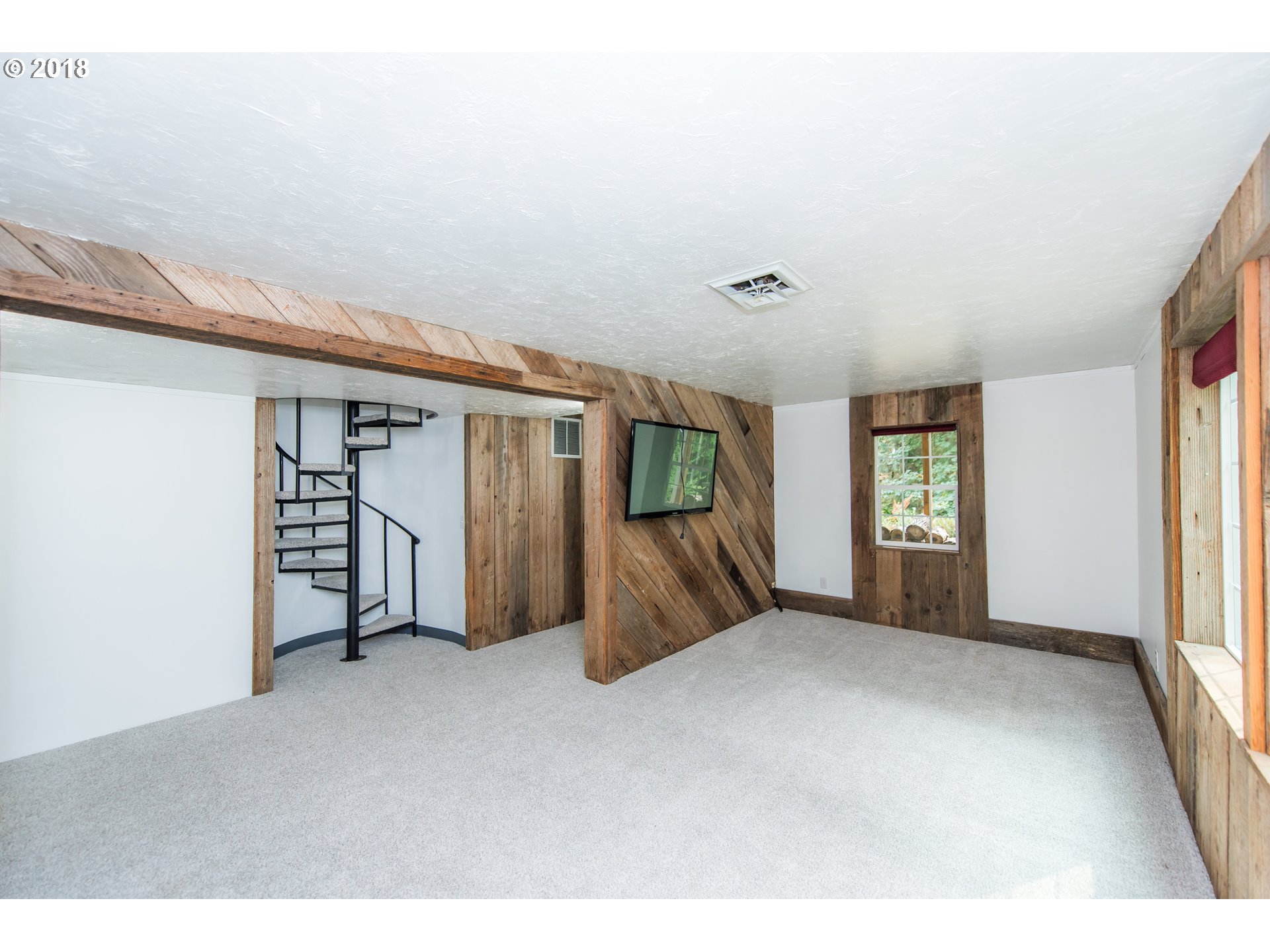 29503 Old Rainier Road Rainier, OR 97048 - Photo 14 of 22 a view of a livingroom with an empty space and a window