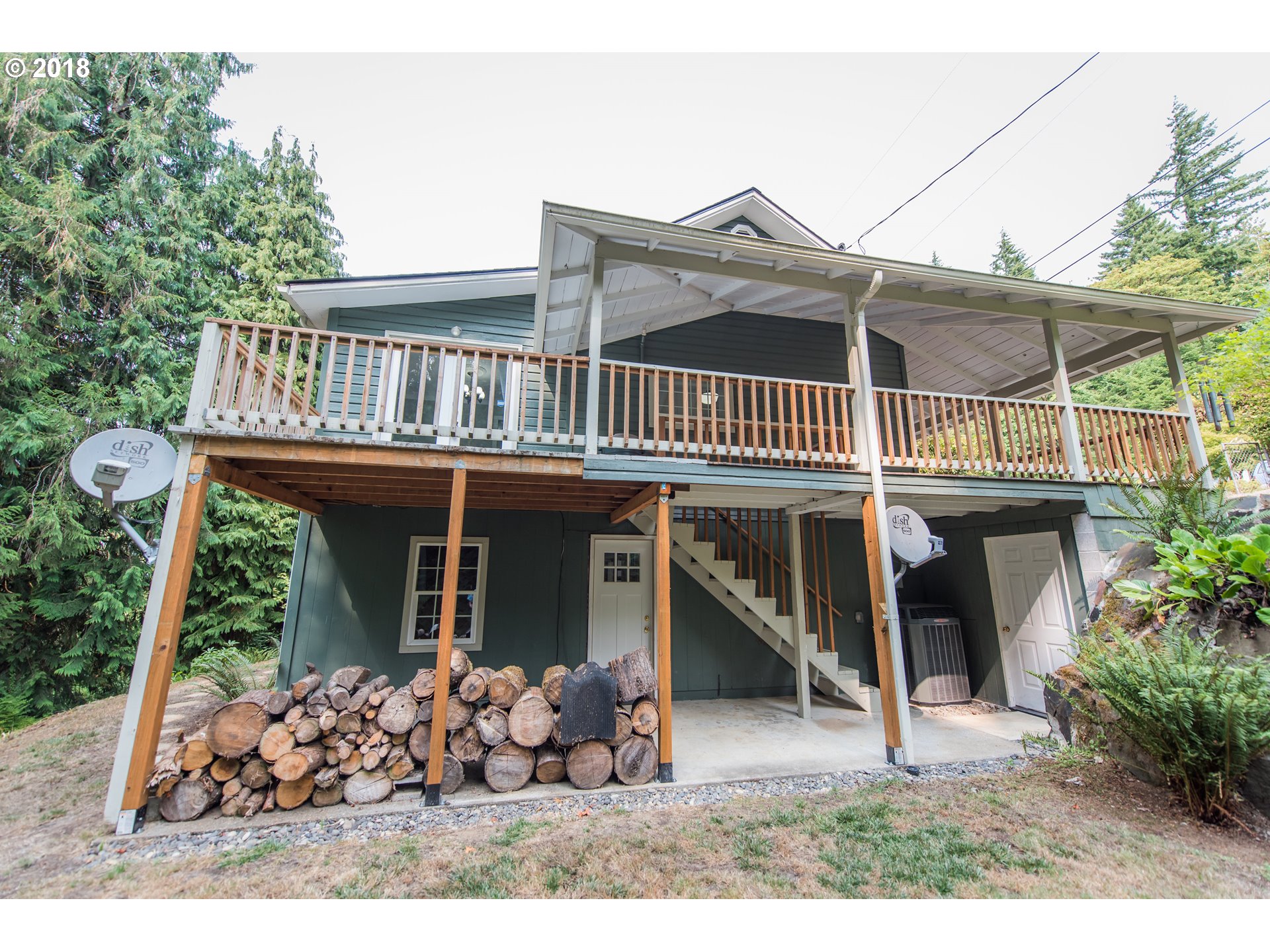 29503 Old Rainier Road Rainier, OR 97048 - Photo 20 of 22 a front view of a house with garden