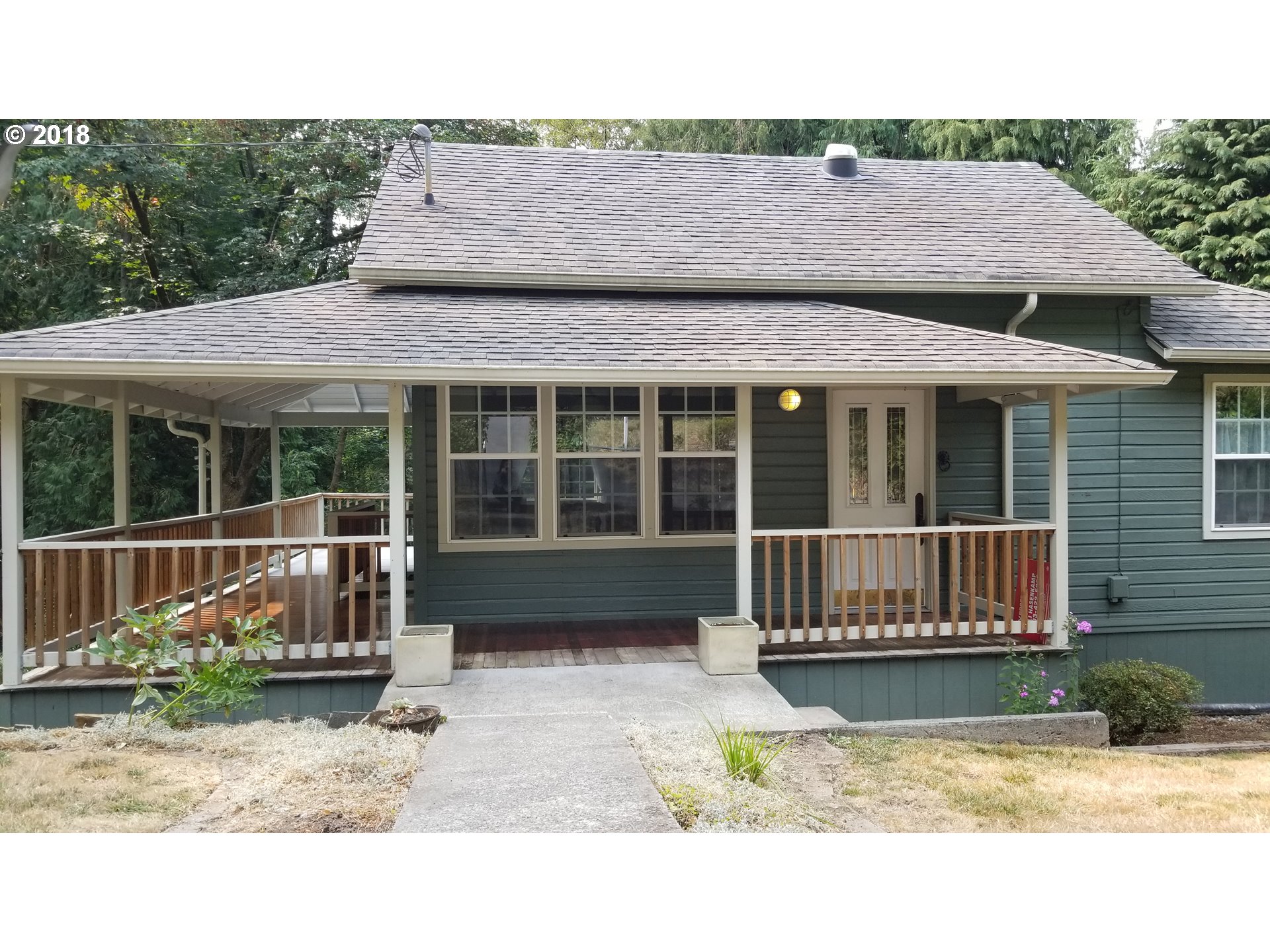29503 Old Rainier Road Rainier, OR 97048 - Photo 2 of 22 a house view with a garden space