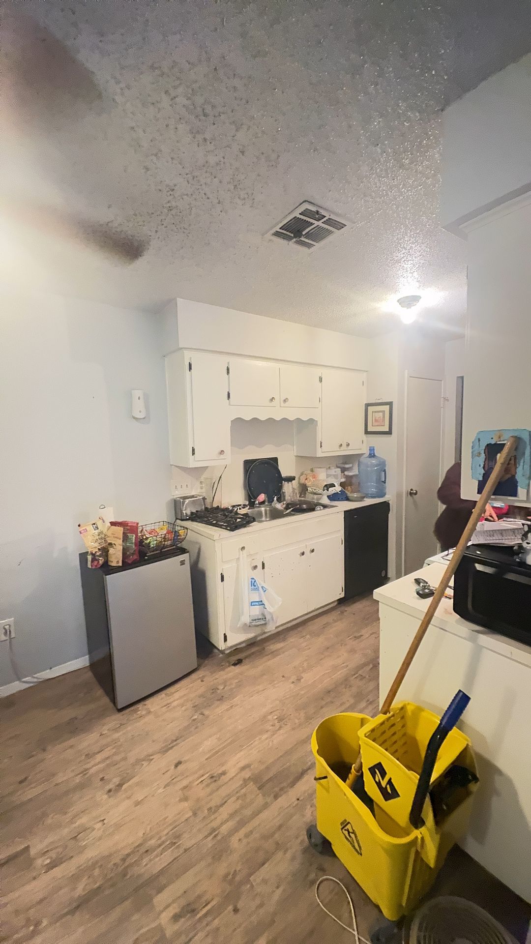 605 Misty Morning Way, Unit B Round Rock, TX 78664 - Photo 4 of 7 a living room with furniture and kitchen view