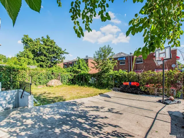 a view of a back yard of the house