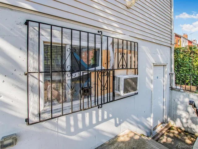 a view of furniture with cabinet and mirror