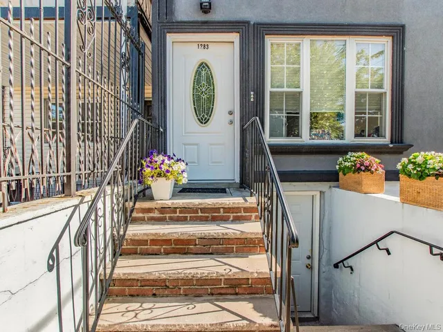 a bedroom with a bed and a mirror