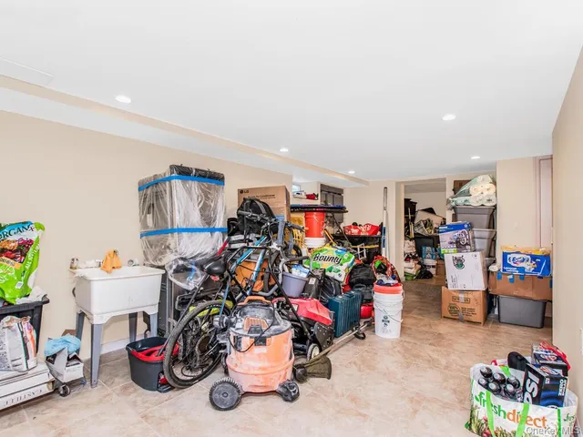 a bathroom with a sink vanity and mirror