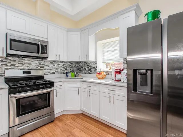 a bathroom with a toilet sink and shower