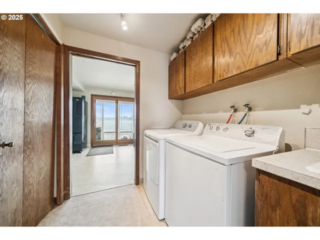 a kitchen with kitchen island granite countertop a sink and stove