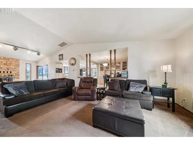 a living room with furniture and a couch