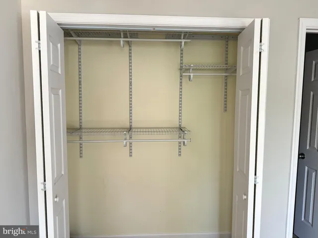 a bathroom with a glass door shower