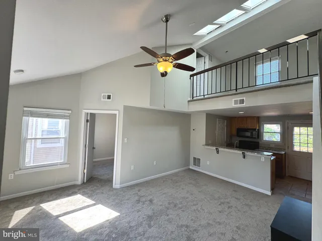 a view of an entryway with a chandelier