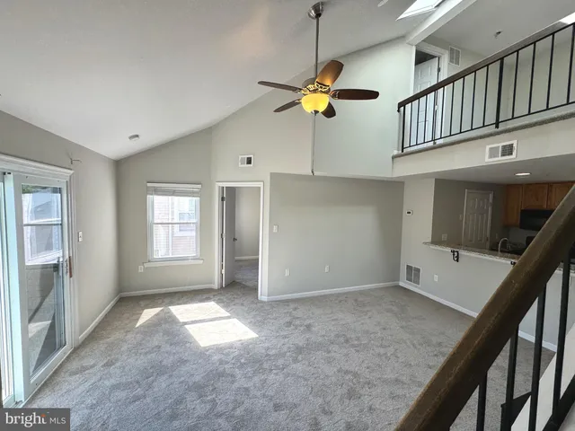 a view of livingroom with furniture and fireplace