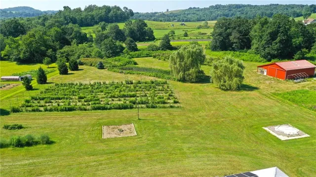 a backyard of a house with lots of green space