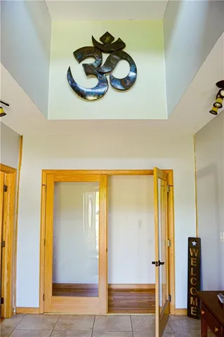 a kitchen with a refrigerator and cabinets