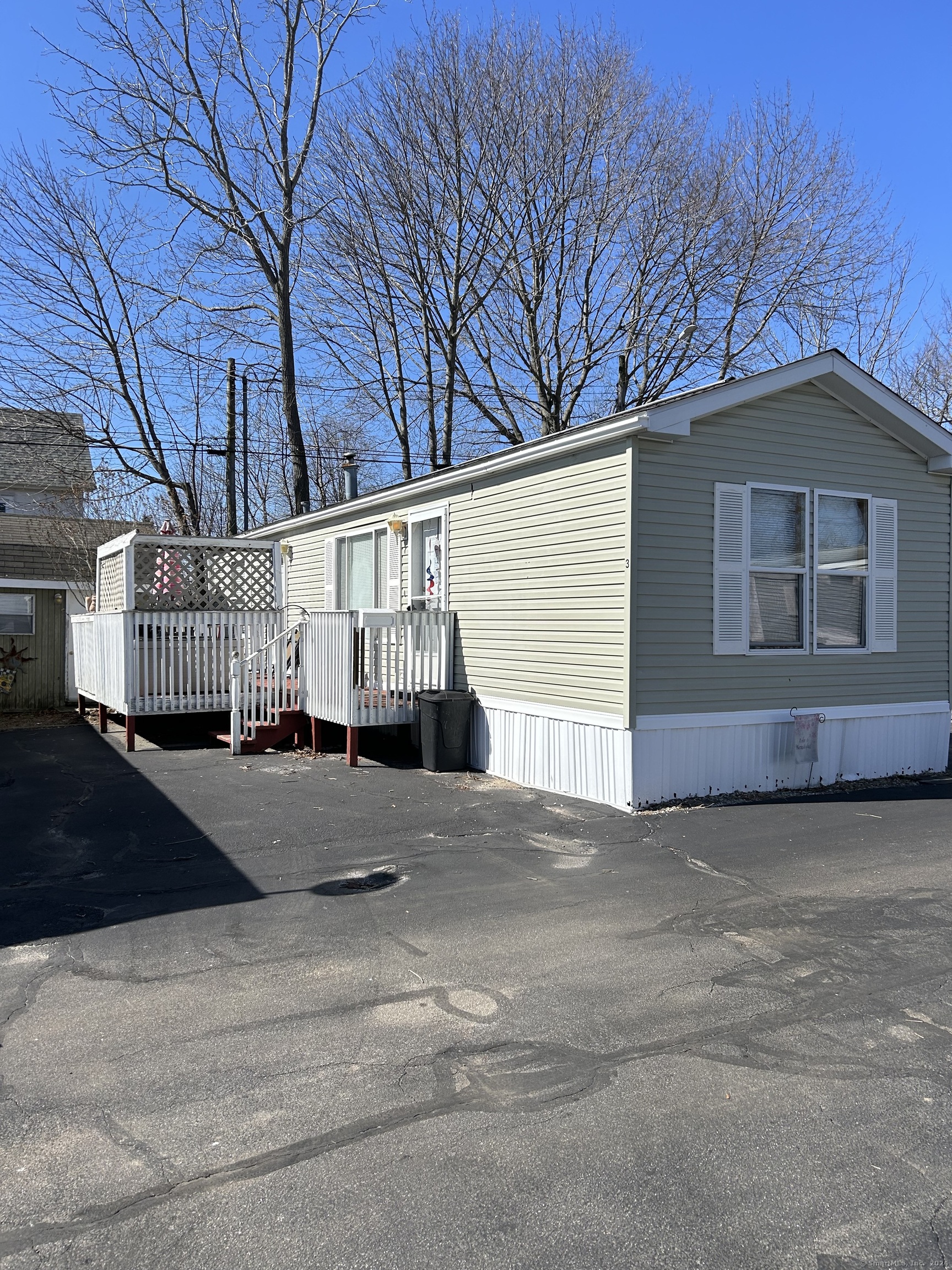 62 Fort Hill Road, Unit 3 Groton, CT 06340 - Photo 1 of 1 a view of back yard of the house