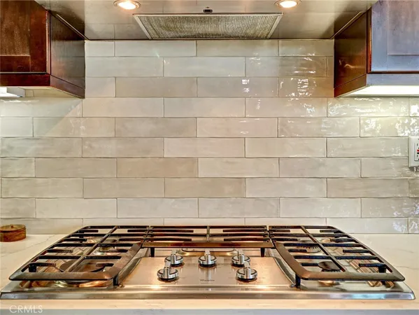 a stove top oven sitting on top of a kitchen counter top