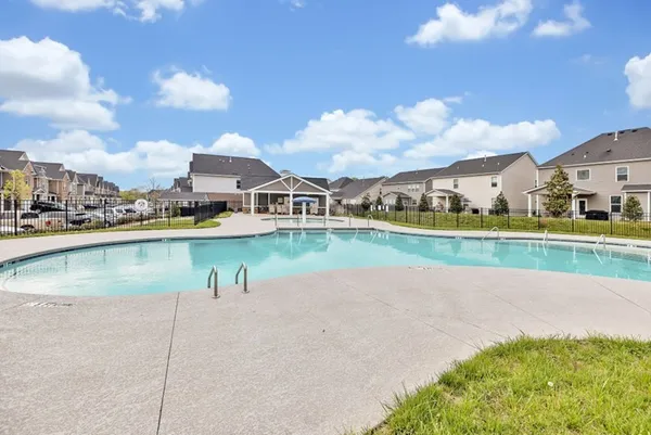 a view of a lake with a house