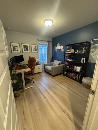 a view of a livingroom with furniture and a couch