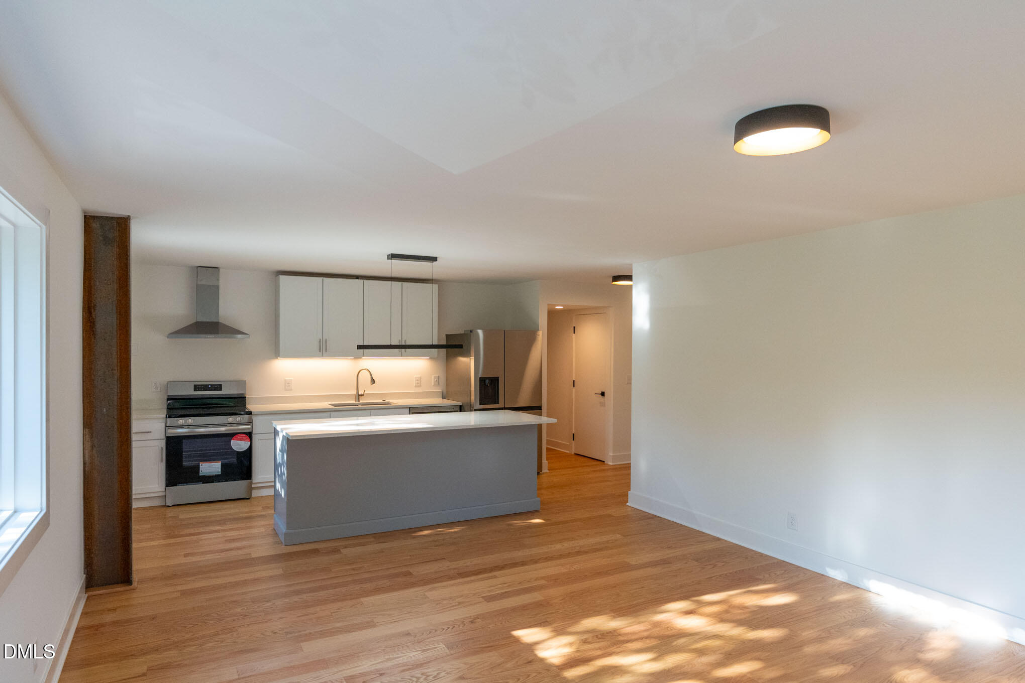 402 East Martin Street Raleigh, NC 27601 - Photo 2 of 23 a view of kitchen with wooden floor