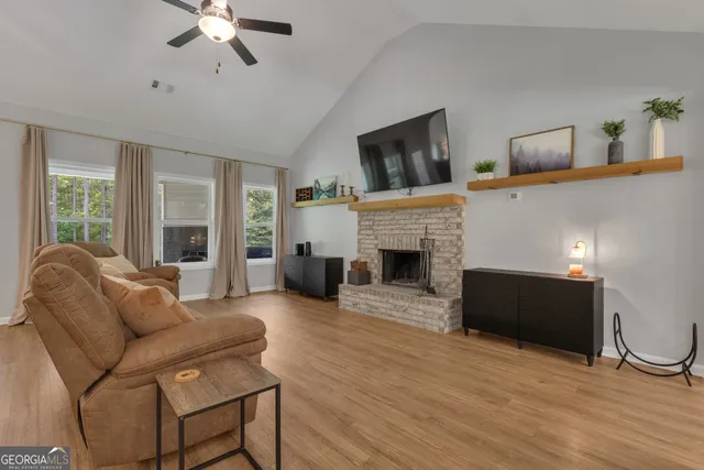 a kitchen with stainless steel appliances a refrigerator and a stove top oven