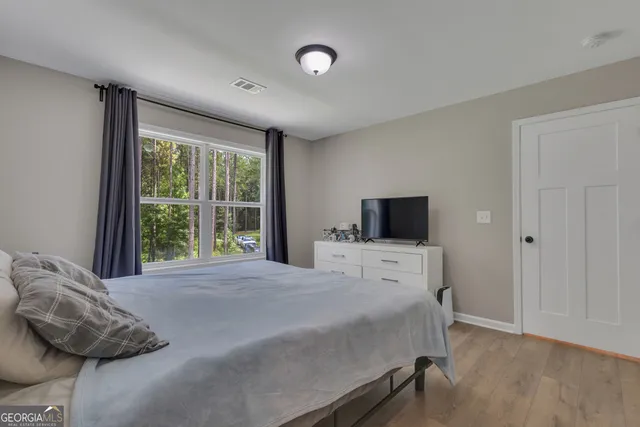 a aerial view of a house with a yard