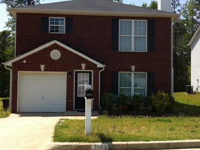 3903 Riverside Parkway Decatur, GA 30034 - Photo 1 of 1 a front view of a house with garden