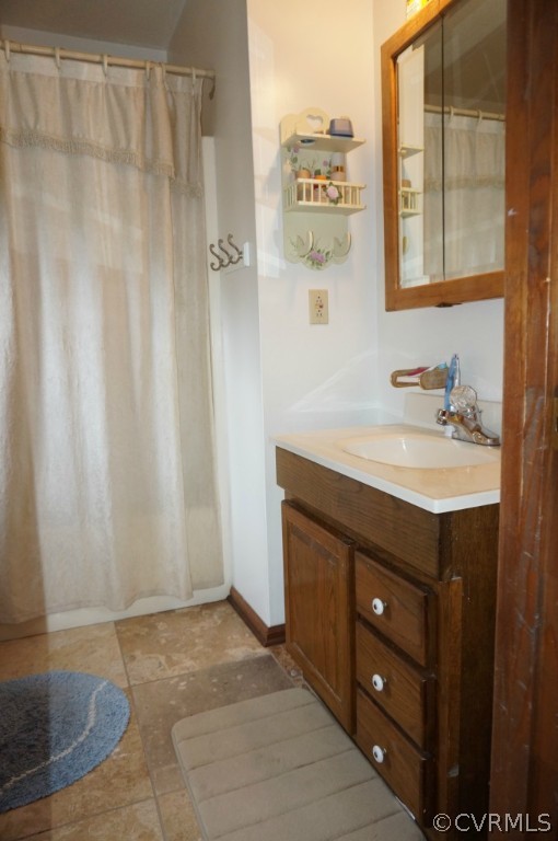 7012 Full Rack Drive Midlothian, VA 23112 - Photo 19 of 24 a bathroom with a sink vanity and a mirror