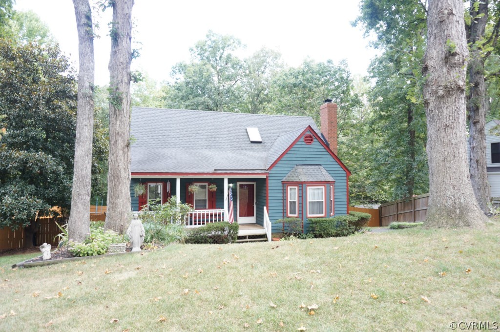 7012 Full Rack Drive Midlothian, VA 23112 - Photo 2 of 24 a front view of a house with yard and trees