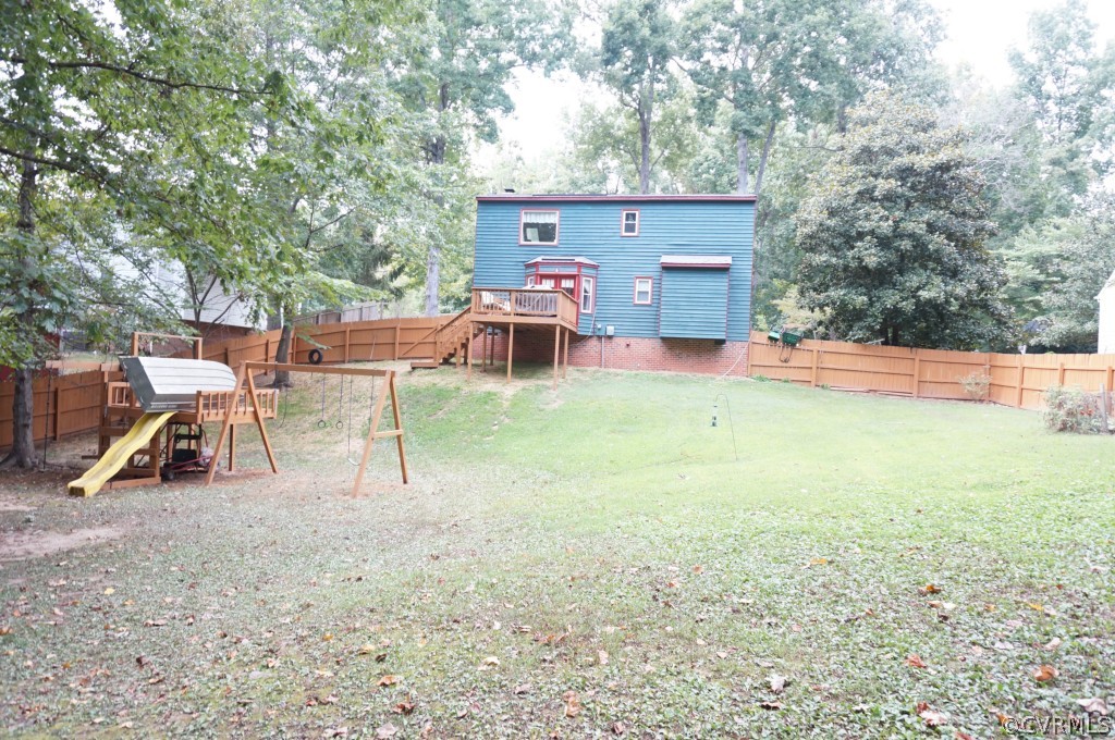 7012 Full Rack Drive Midlothian, VA 23112 - Photo 24 of 24 a view of a house with backyard porch and sitting area