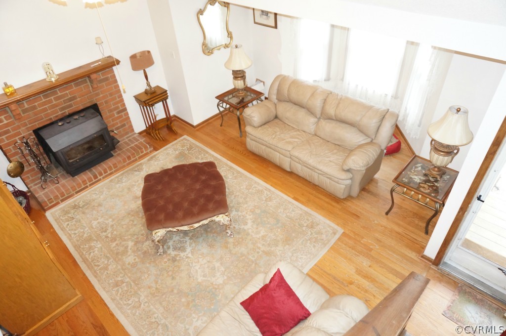 7012 Full Rack Drive Midlothian, VA 23112 - Photo 3 of 24 a living room with furniture and a flat screen tv