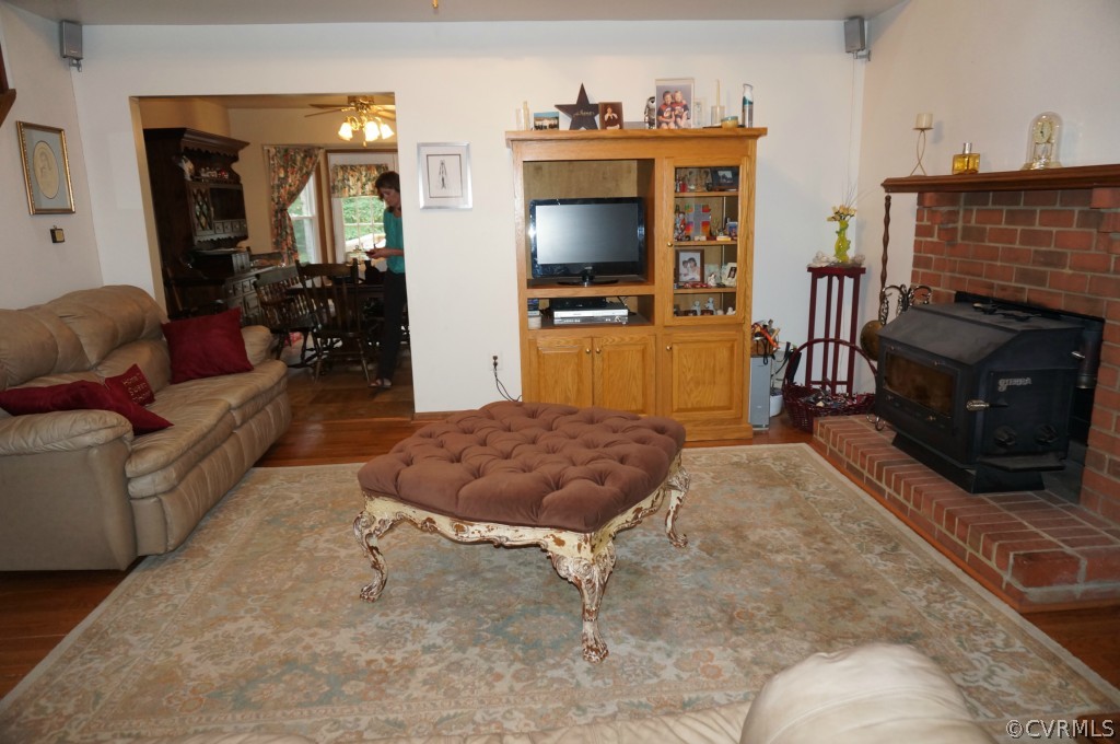 7012 Full Rack Drive Midlothian, VA 23112 - Photo 6 of 24 a living room with furniture and a flat screen tv