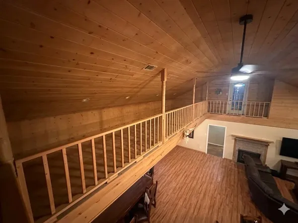 a view of a swimming pool with a yard