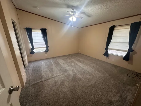 a bathroom with a sink and a wooden floor