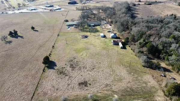 a view of a balcony with furniture