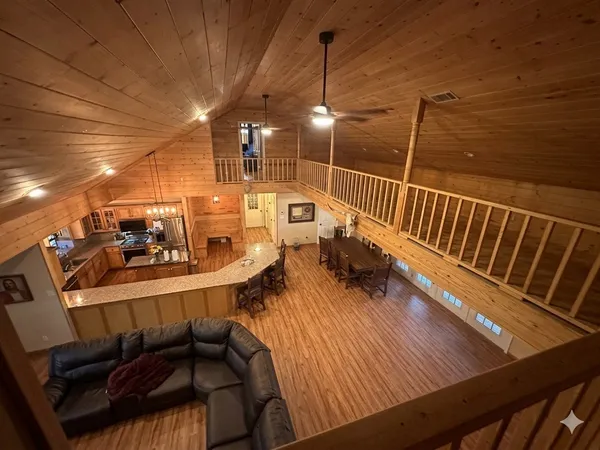 a view of a living room and dining room