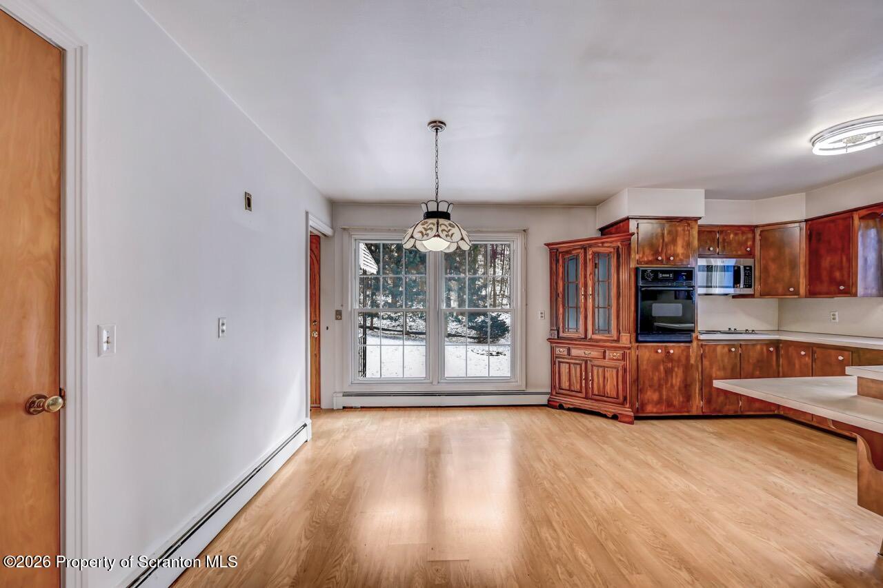 148 Green Grove Road Scott Township, PA 18447 - Photo 22 of 67 a view of a room with wooden floor and window