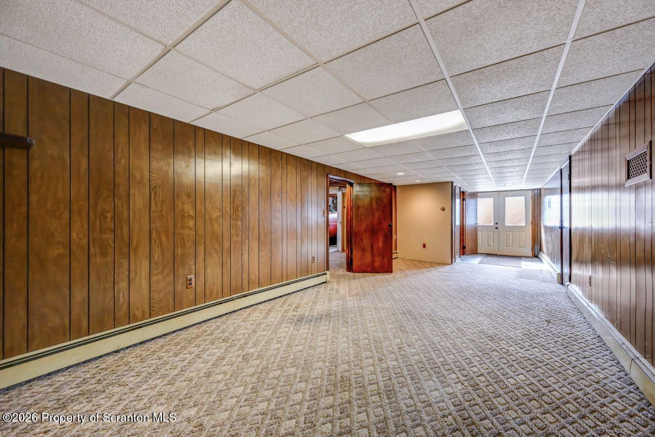 148 Green Grove Road Scott Township, PA 18447 - Photo 45 of 67 a view of an empty room with wooden walls