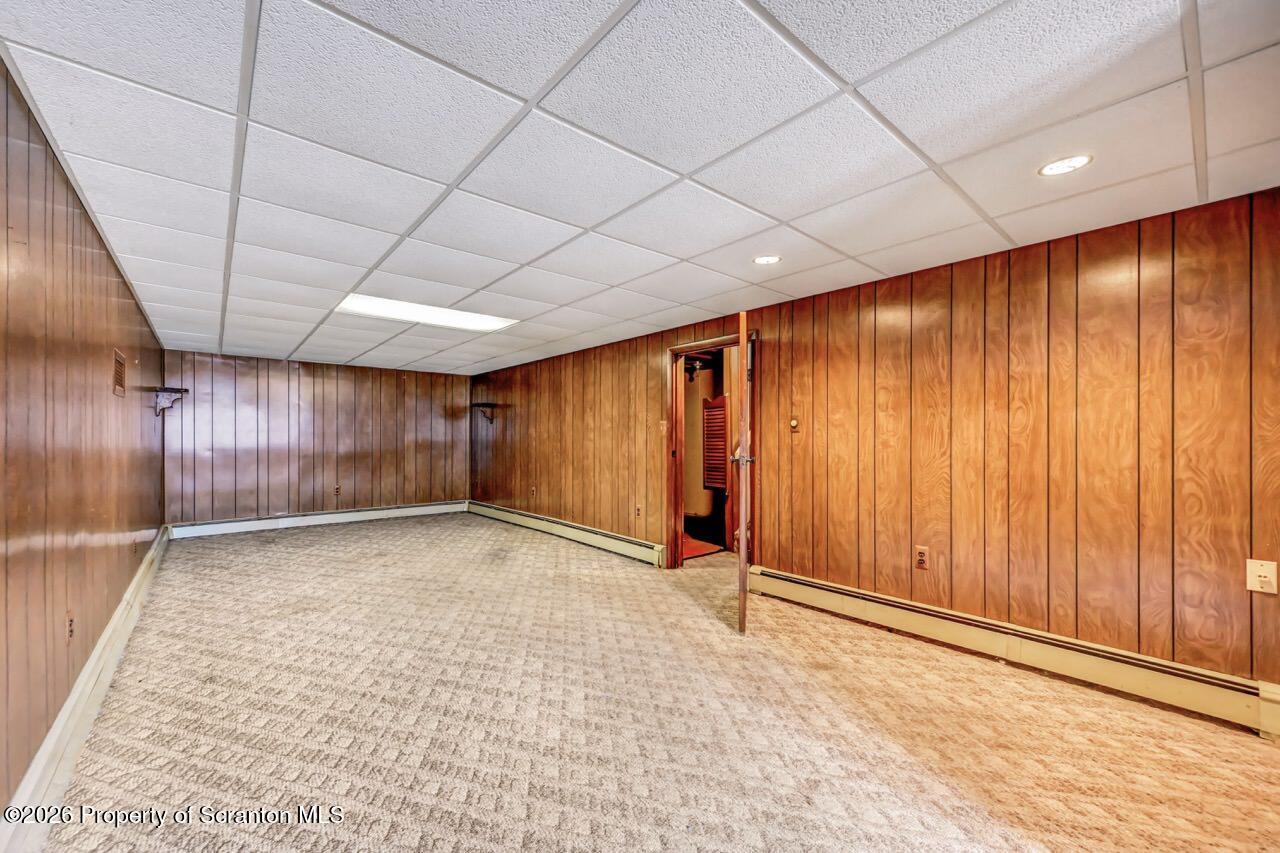 148 Green Grove Road Scott Township, PA 18447 - Photo 46 of 67 a view of an empty room with wooden walls