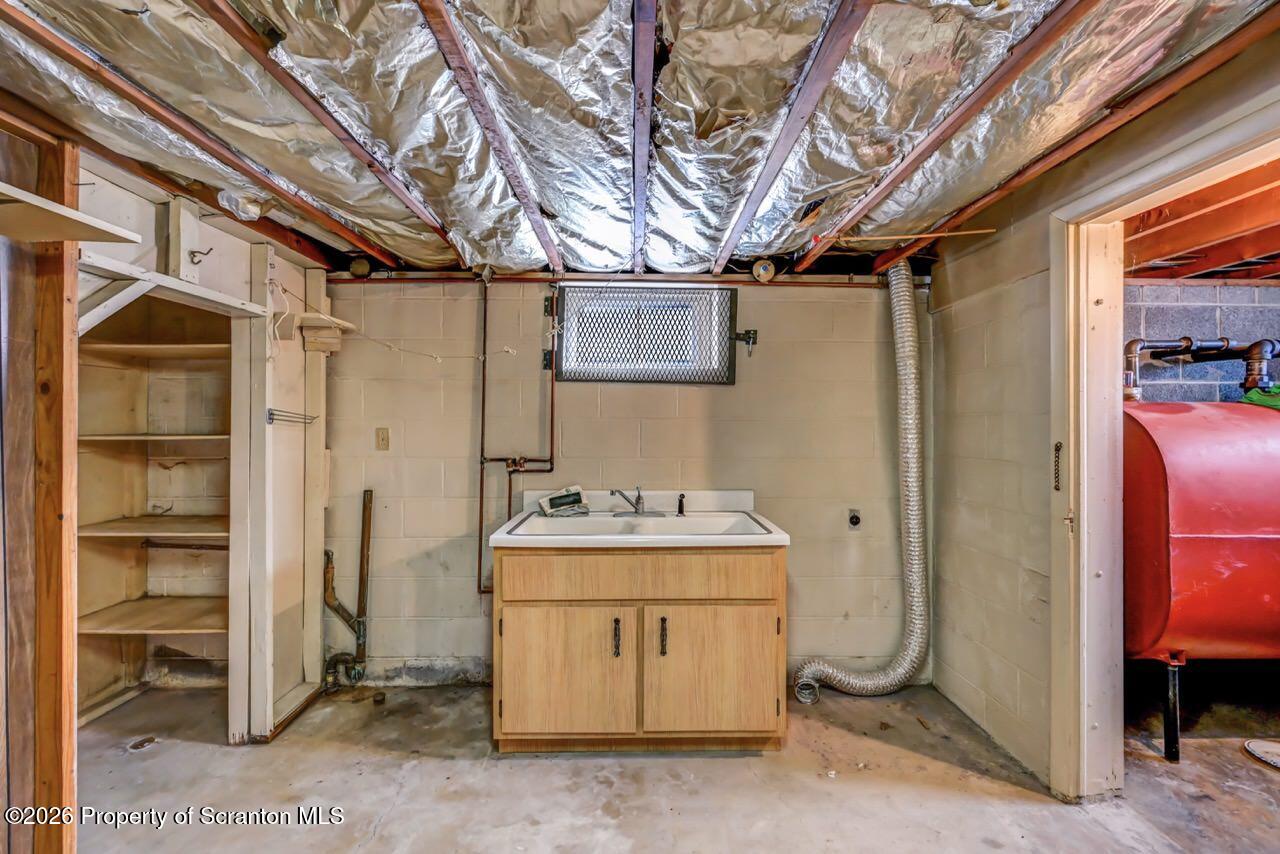 148 Green Grove Road Scott Township, PA 18447 - Photo 58 of 67 a utility room with dryer and washer