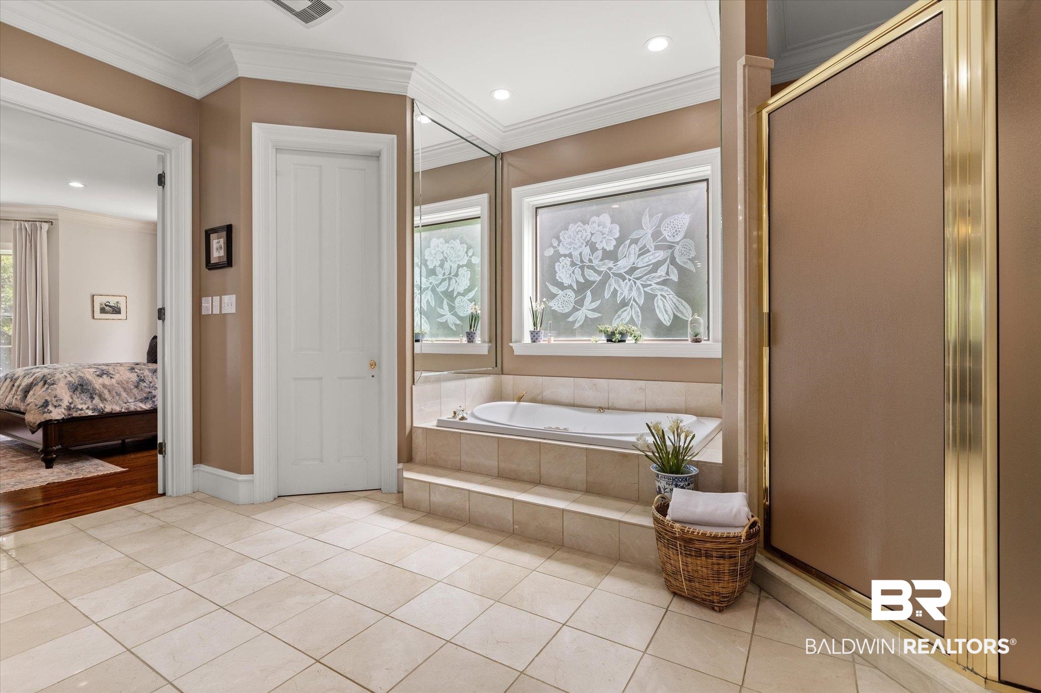 8561 Dawes Lake Road Mobile, AL 36619 - Photo 18 of 63 Ensuite bathroom featuring a garden tub, a shower stall, tile patterned floors, recessed lighting, and crown molding
