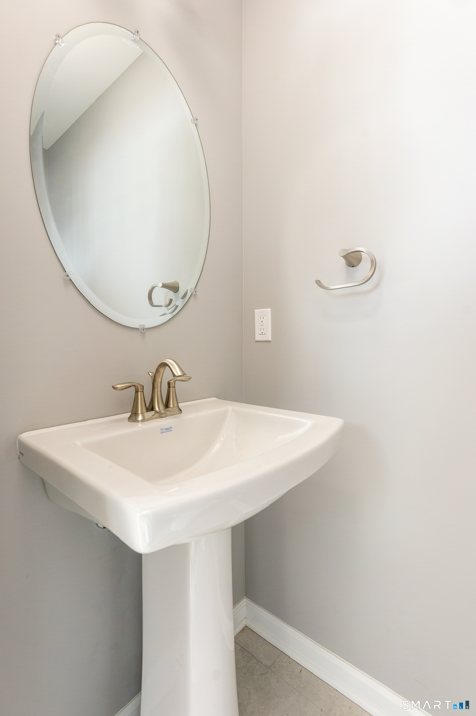 25 Hall Avenue Wallingford, CT 06492 - Photo 9 of 16 a bathroom with a sink and a mirror