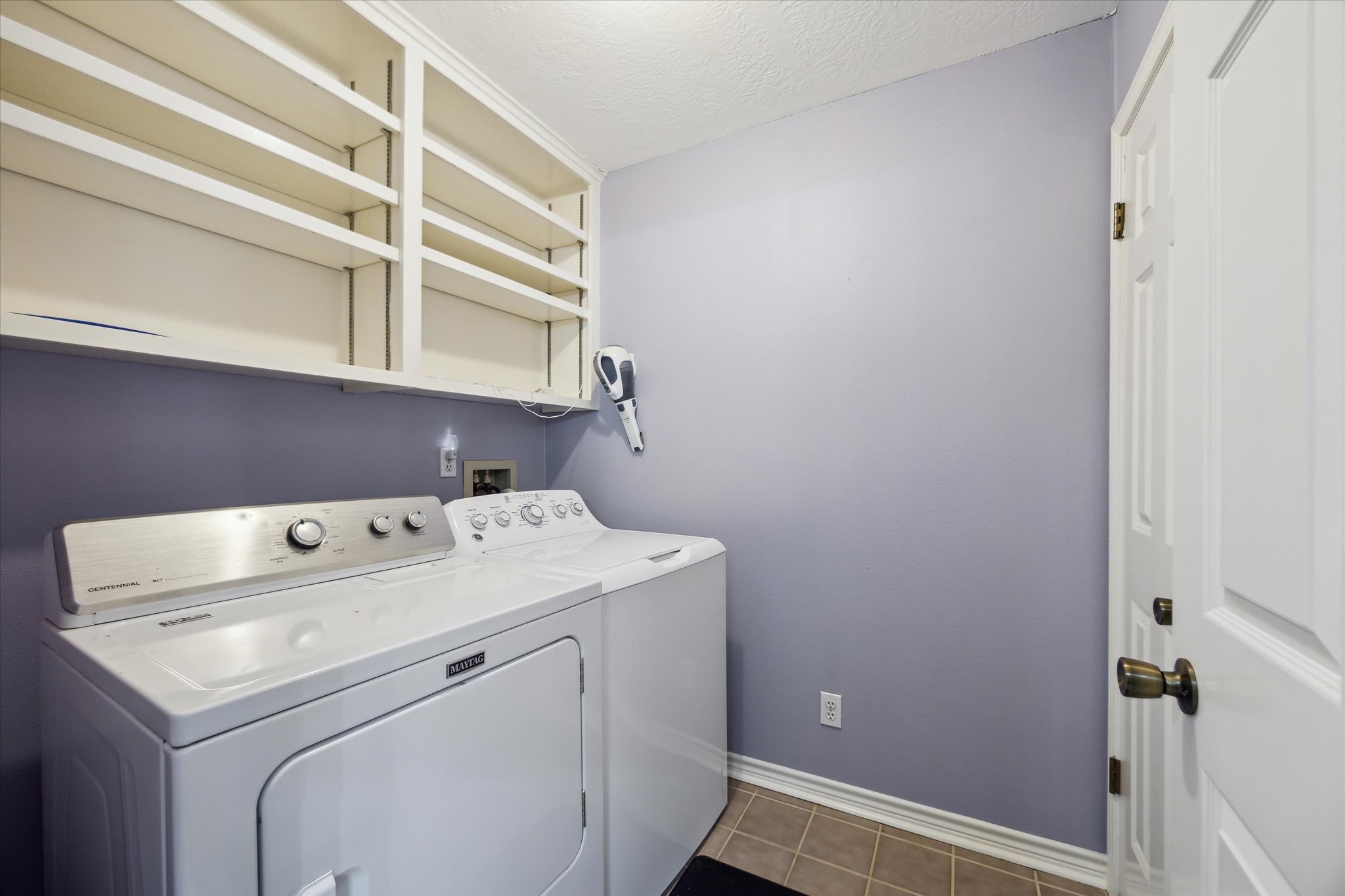 1011 FM 2502 Road Bellville, TX 77418 - Photo 16 of 17 a utility room with dryer and washer