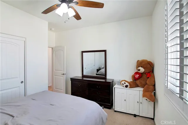 a bedroom with a bed and furniture