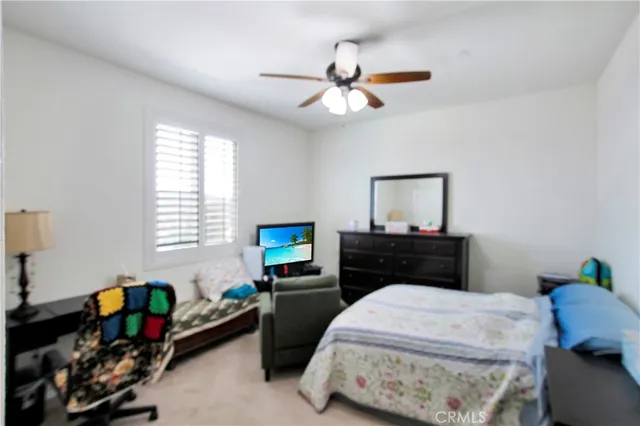 a bathroom with a bathtub a double vanity sink and mirror