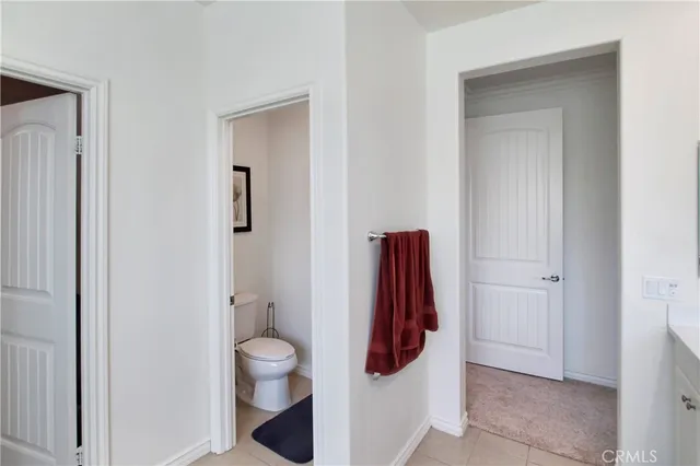 a view of a swimming pool and lounge chairs