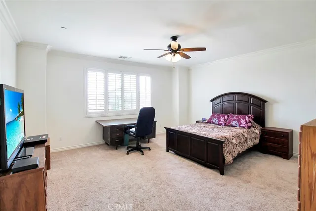 a view of a house with swimming pool and sitting area