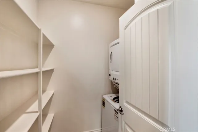 a bathroom with a shower sink vanity mirror and toilet