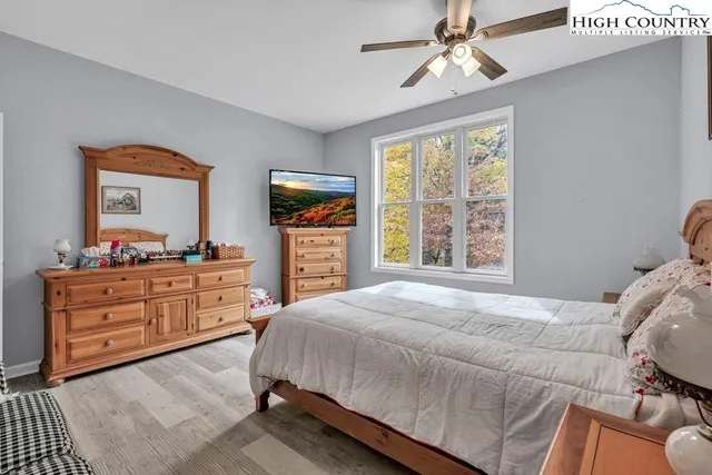 a bathroom with a sink a toilet and a shower