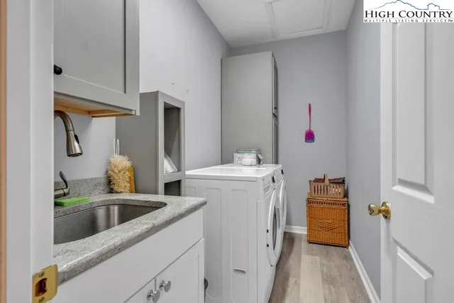 a spacious bedroom with a bed and a couch