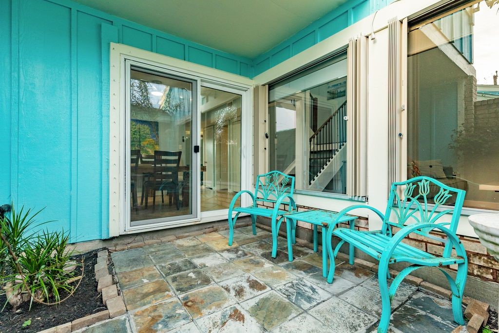 7516 Stewart Road Galveston, TX 77551 - Photo 6 of 25 a view of front door with outdoor seating